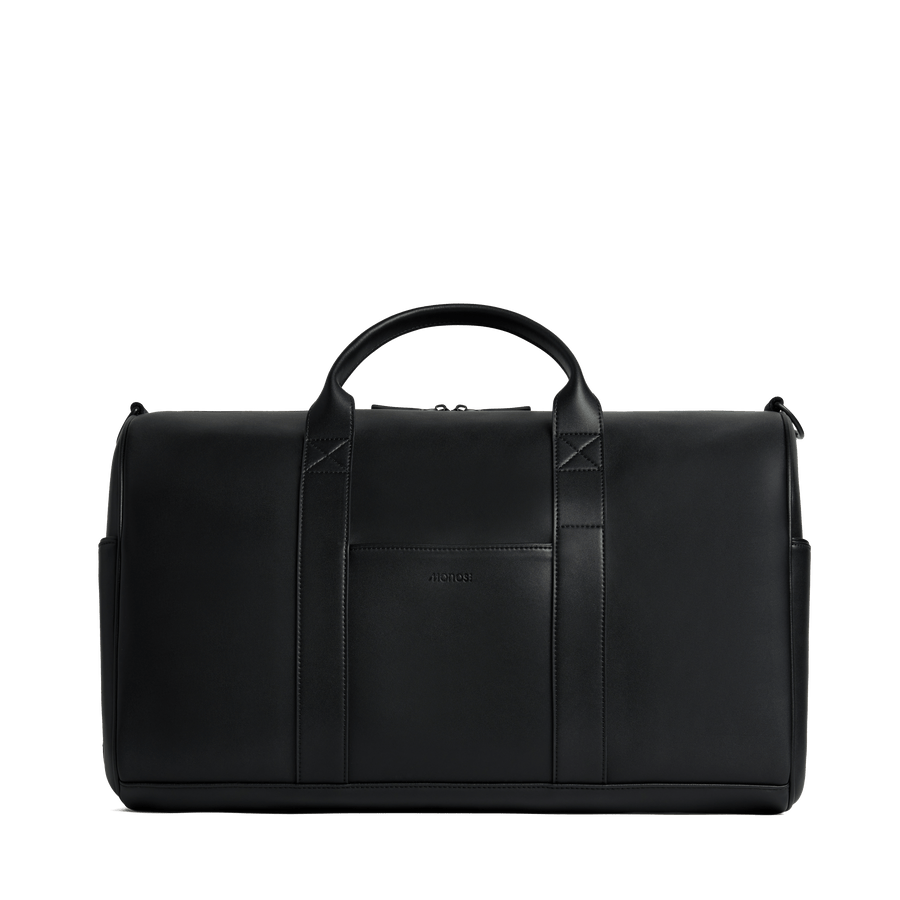 Carbon Black (Vegan Leather) Scaled | Front view of Metro Carry-All Duffel in Carbon Black