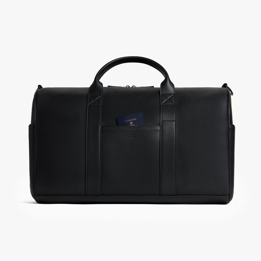 Carbon Black (Vegan Leather) | Front view of Metro Carry-All Duffel in Carbon Black