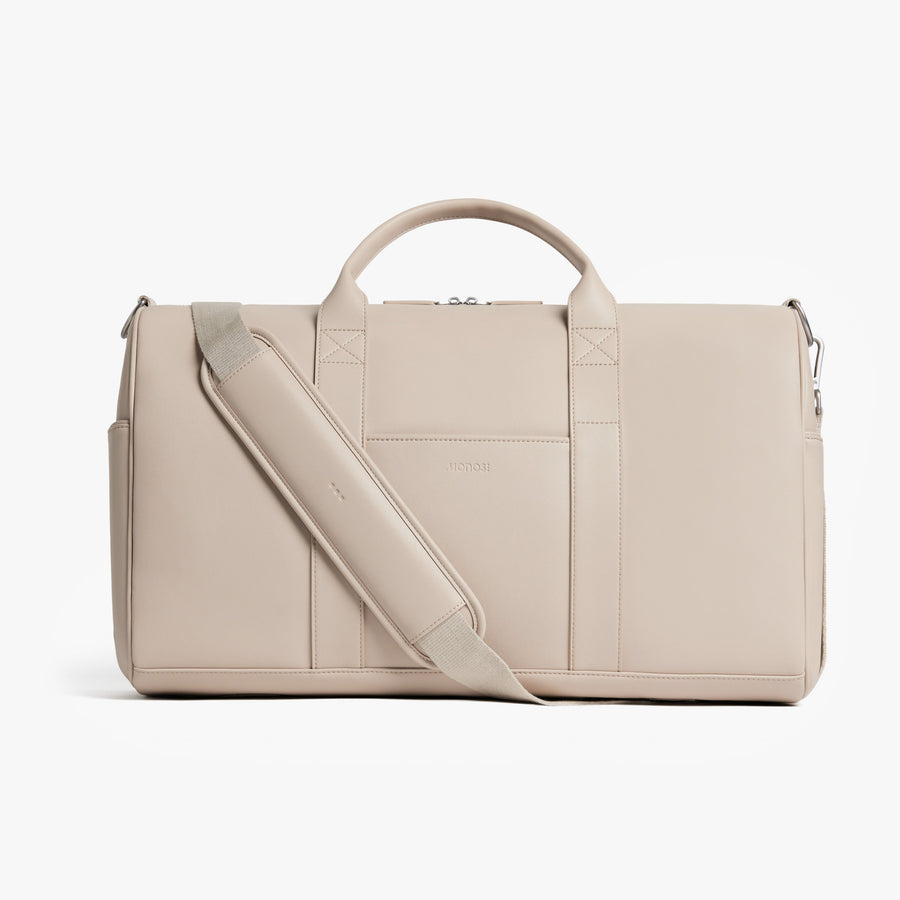 Ivory (Vegan Leather) | Front view of Metro Carry-All Duffel in Ivory