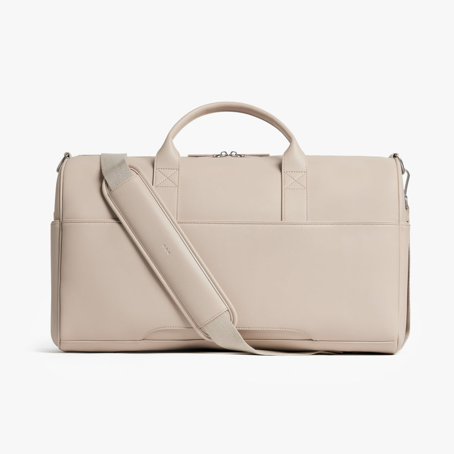 Ivory (Vegan Leather) | Back view of Metro Carry-All Duffel in Ivory