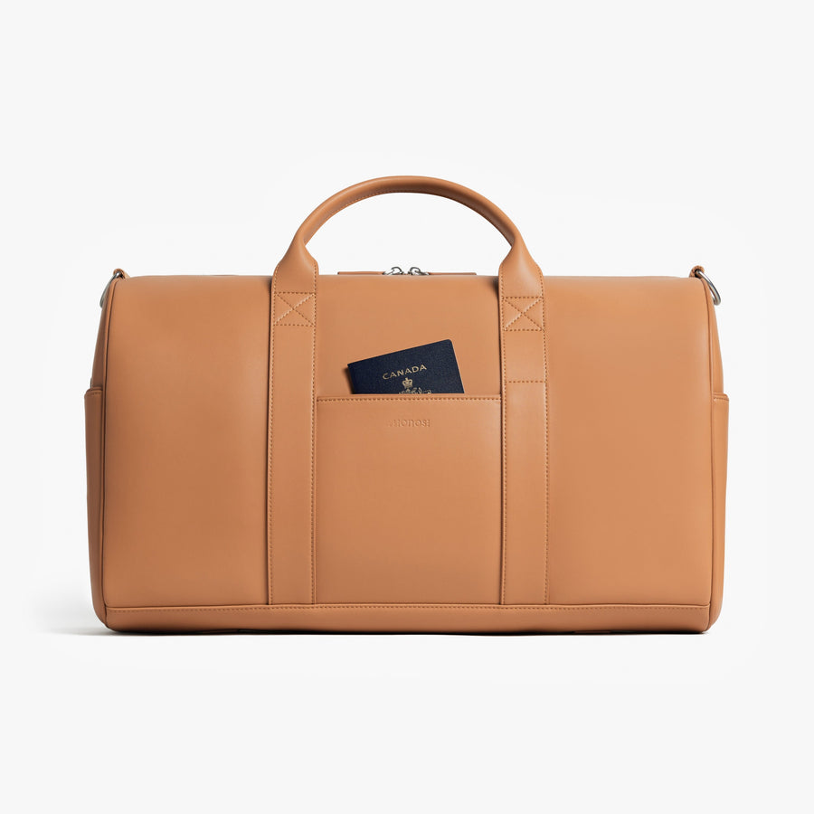 Saddle Tan (Vegan Leather) | Front view of Metro Carry-All Duffel in Saddle Tan