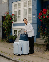 Monos Blue Haze Check-In Medium and Carry-On Pro Suitcase