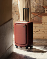 Monos Terracotta Carry-On Pro Suitcase for the cabin