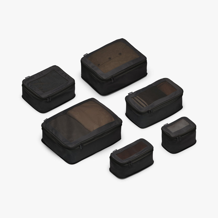 Set of Six / Black | This is a photo of a set of six compressible packing cubes in black