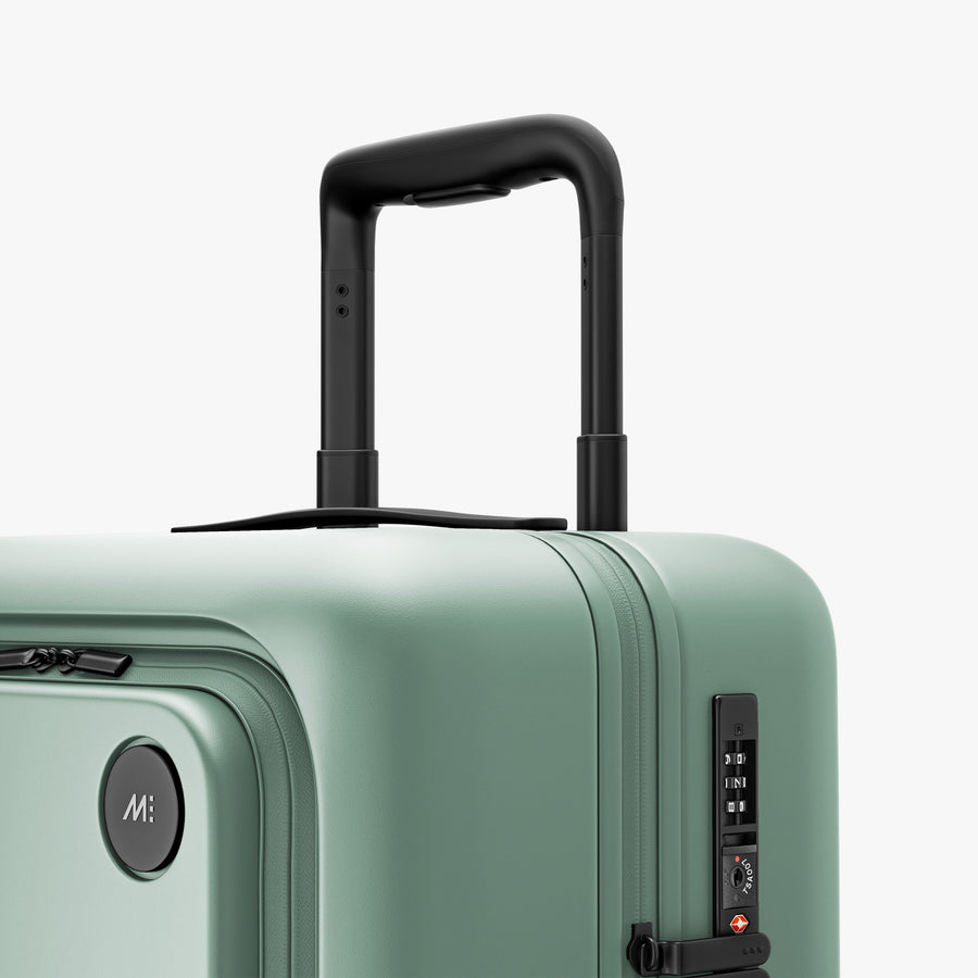 Sage Green | Luggage handle view of Carry-On Pro in Sage Green