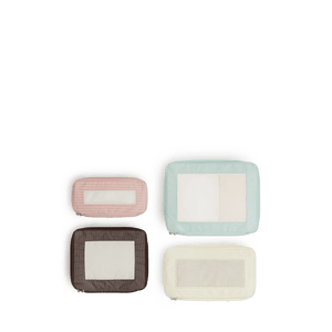 Set of Four / Multi Scaled | Set of four top view of Monos x Reformation compressible packing cubes in Multi colors
