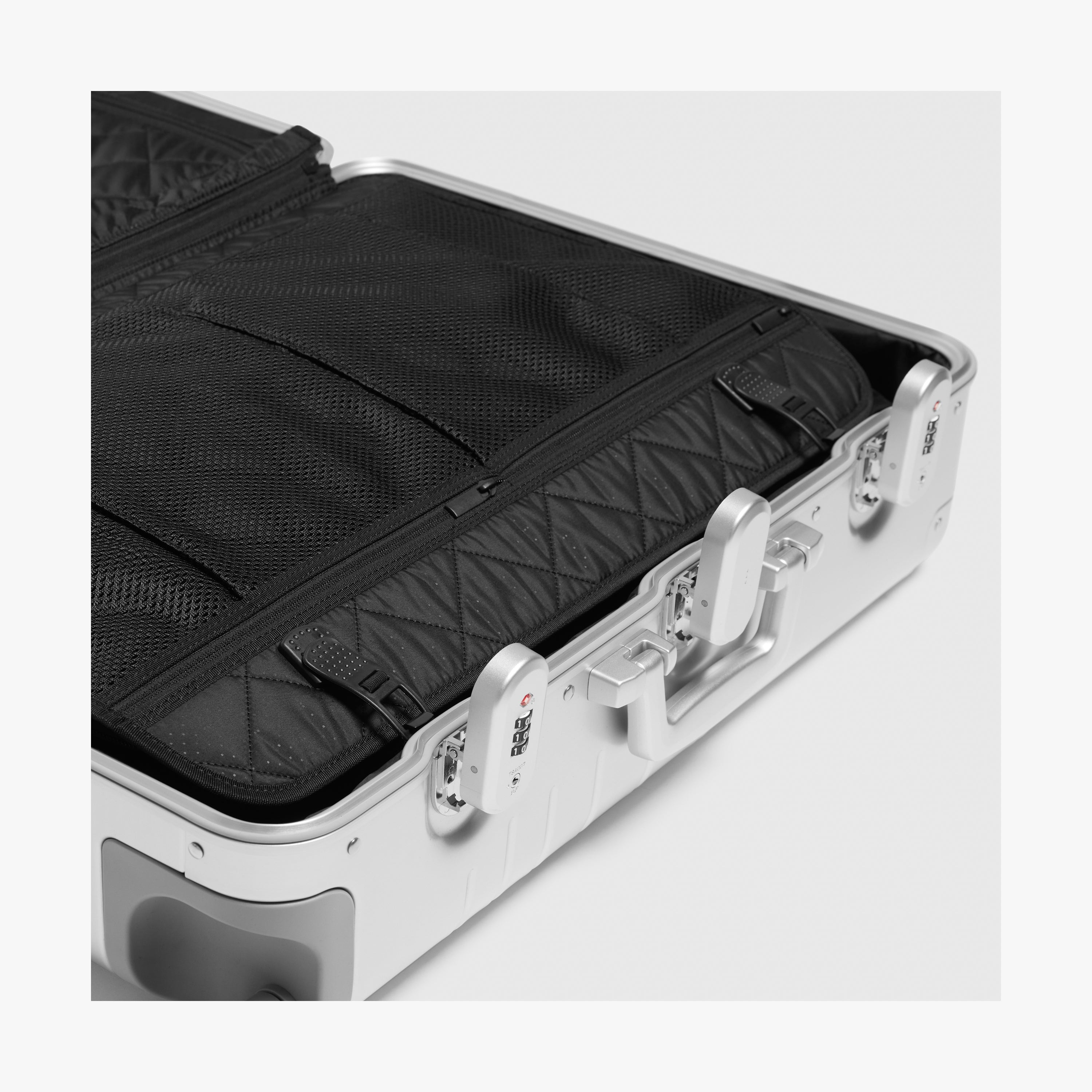 Aluminum Check-In Medium | Monos Luggage and Suitcases