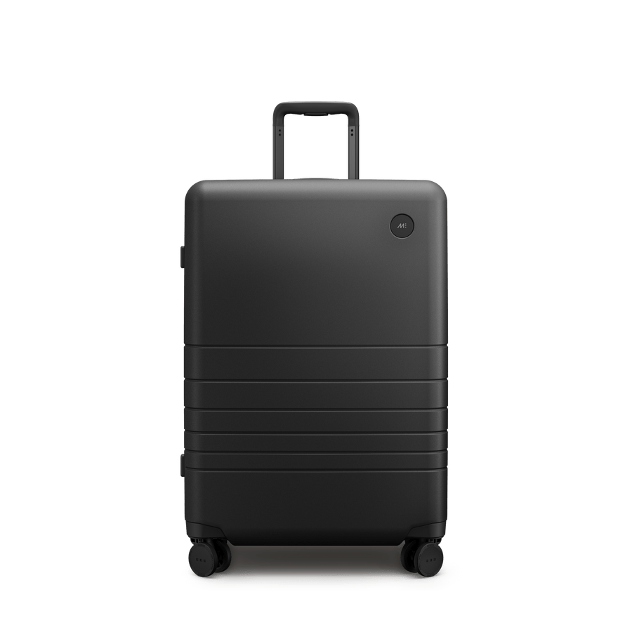 Midnight Black Scaled | Front view of Expandable Check-In Medium in Midnight Black
