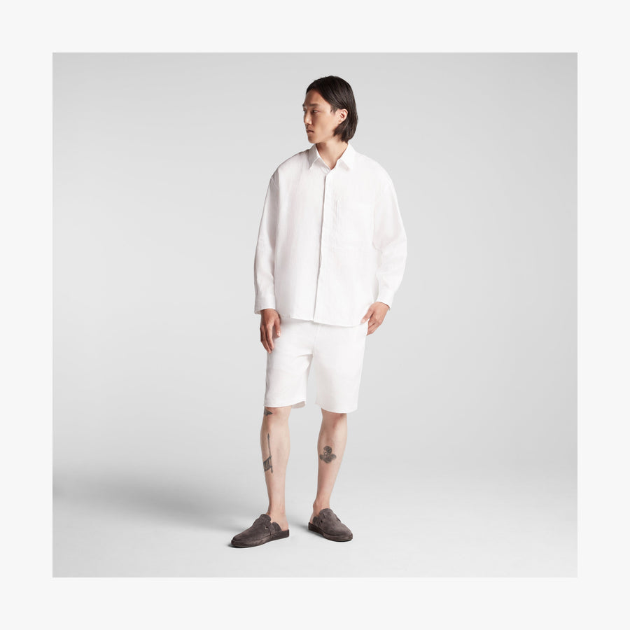 White | Full body front view of man in Algarve Shirt in White