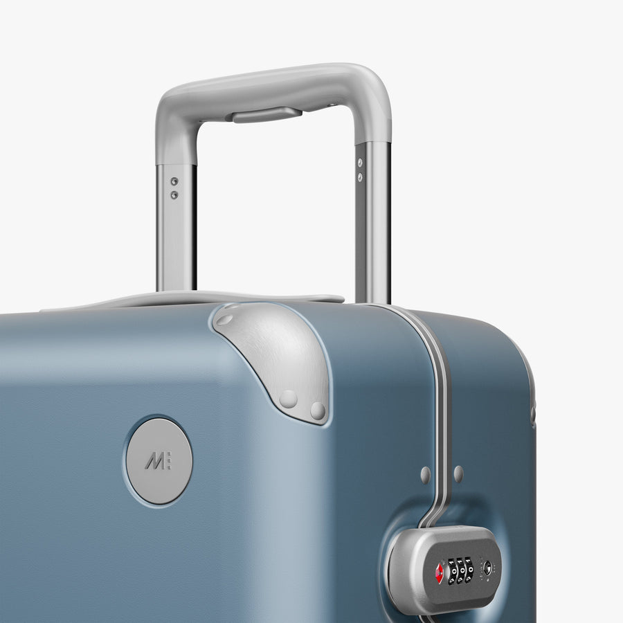 Elemental Blue | Luggage handle view of Hybrid Carry-On Plus in Elemental Blue