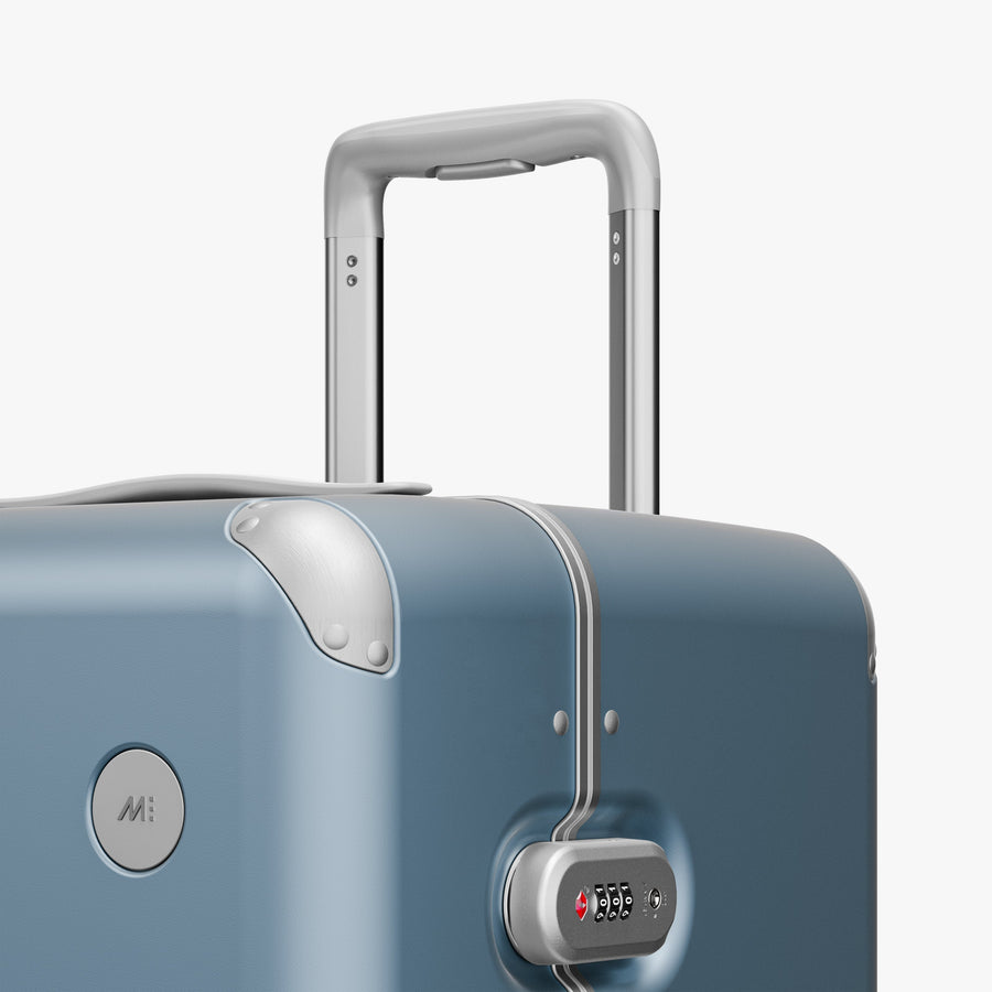 Elemental Blue | Luggage handle view of Hybrid Trunk in Elemental Blue