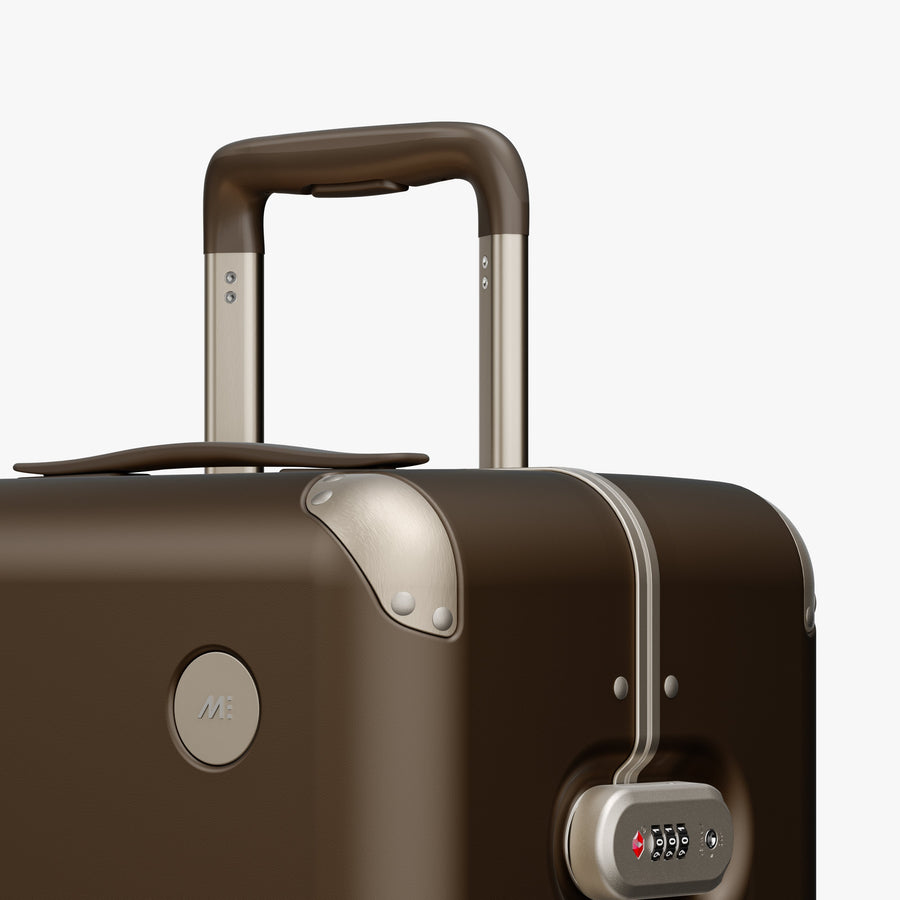 Adobe Brown | Luggage handle view of Hybrid Check-In Medium in Adobe Brown