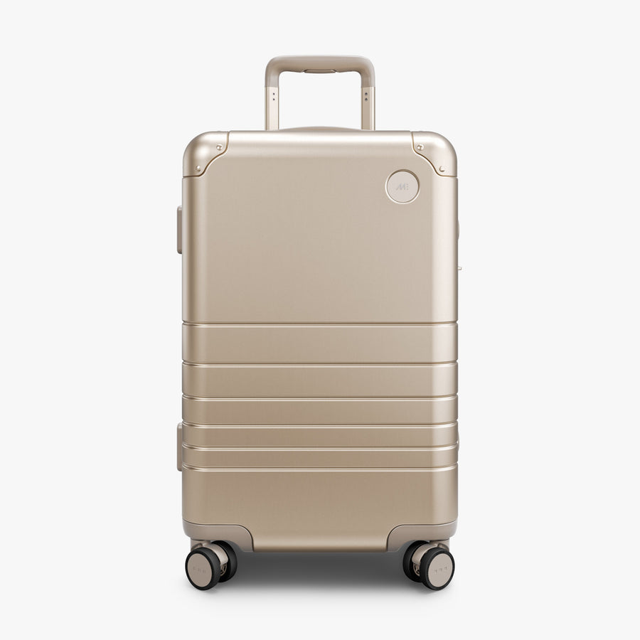 Champagne Gold | Front view of Aluminum Carry-On Plus in Champagne Gold