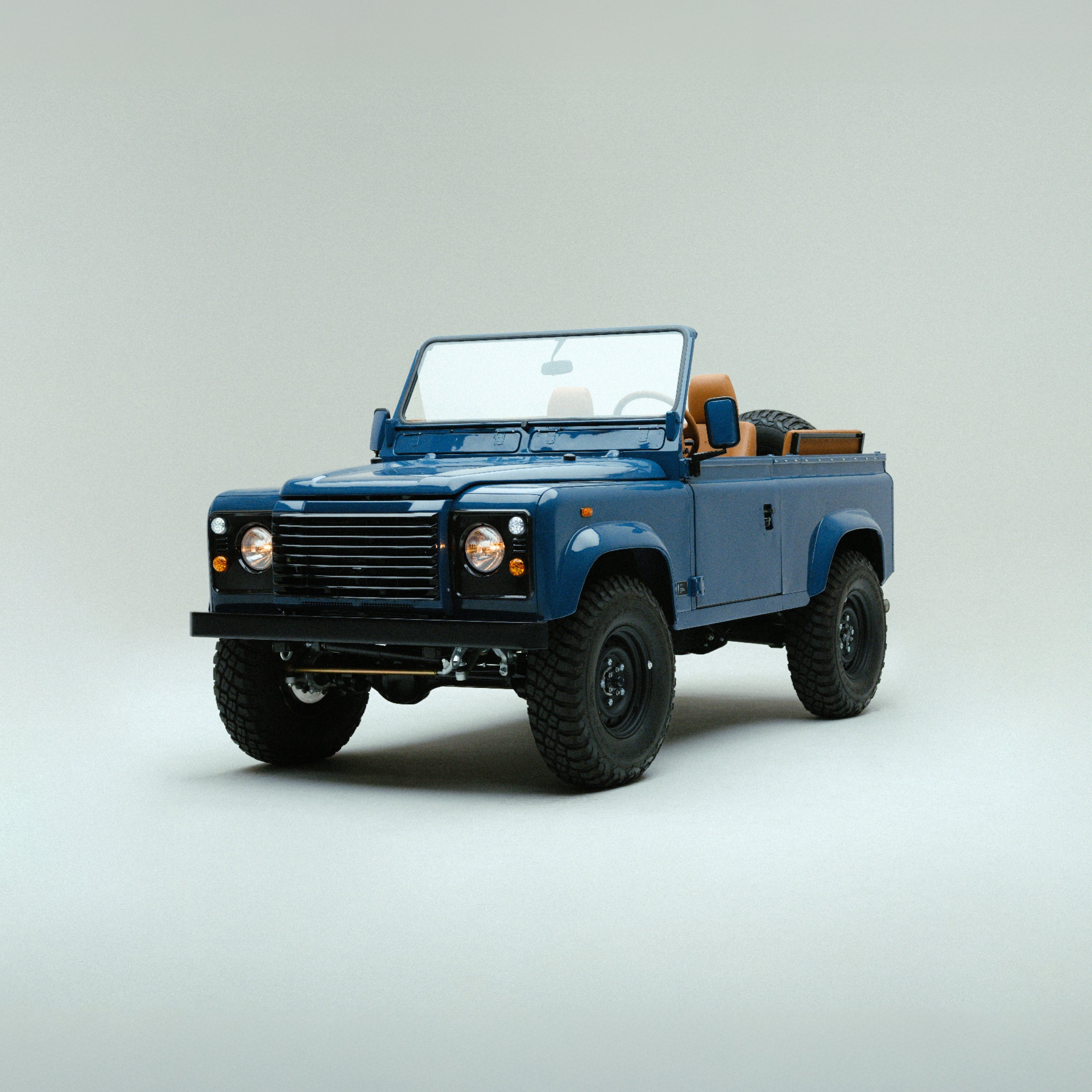 Land Rover Defender in Arles Blue, Brooklyn Coachworks | Monos Luggage