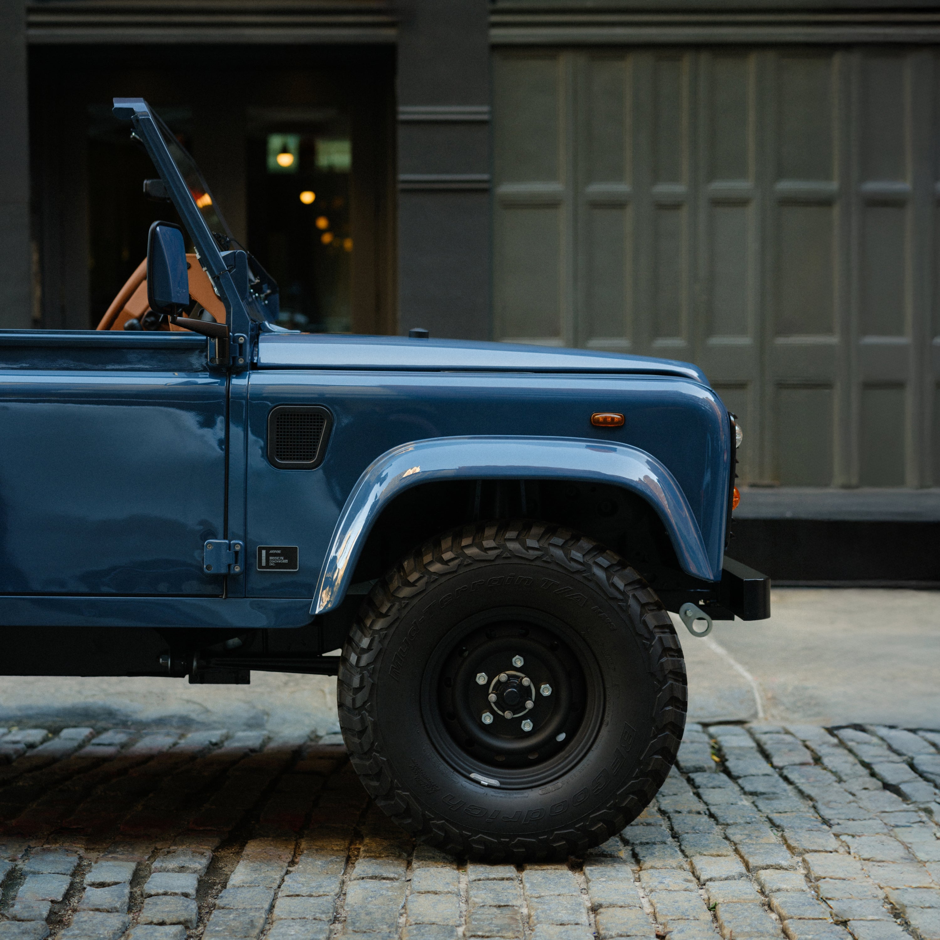 Land Rover Defender in Arles Blue, Brooklyn Coachworks | Monos Luggage