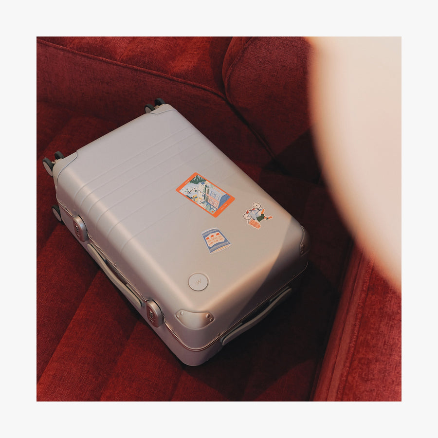New York | All three Destination Stickers of New York stickers set on a laying suitcase