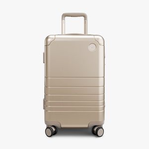 Champagne Gold | Front view of Aluminum Carry-On in Champagne Gold
