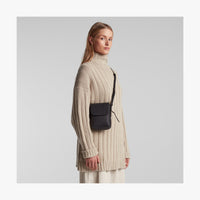 Angled view of Metro Mini Crossbody in Carbon Black (thumbnail)