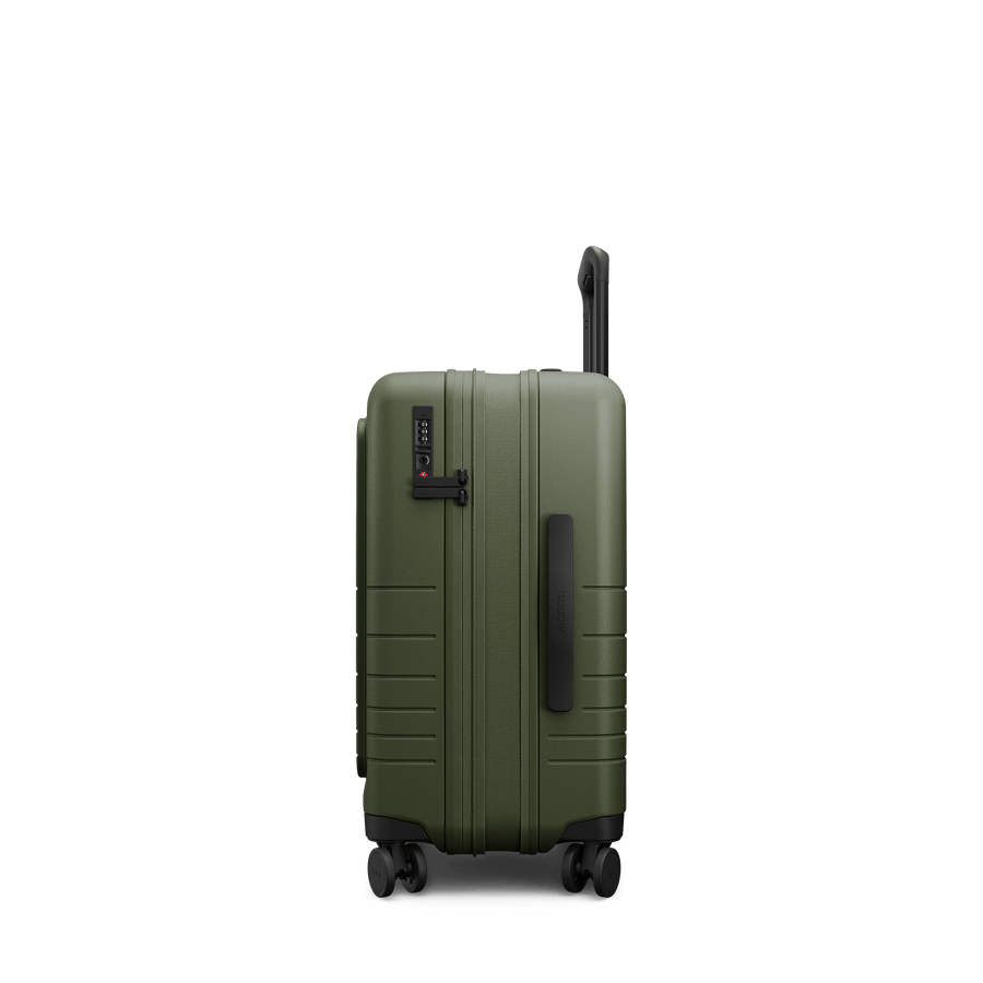 Olive Green Hover | Side view of Expandable Carry-On Pro in Olive Green