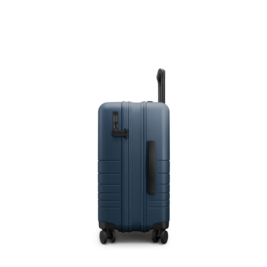 Ocean Blue Hover | Side view of Expandable Carry-On  in Ocean Blue