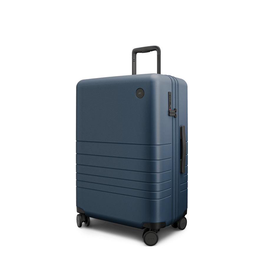 Ocean Blue Scaled | Angle view of Expandable Check-In Medium in Ocean Blue