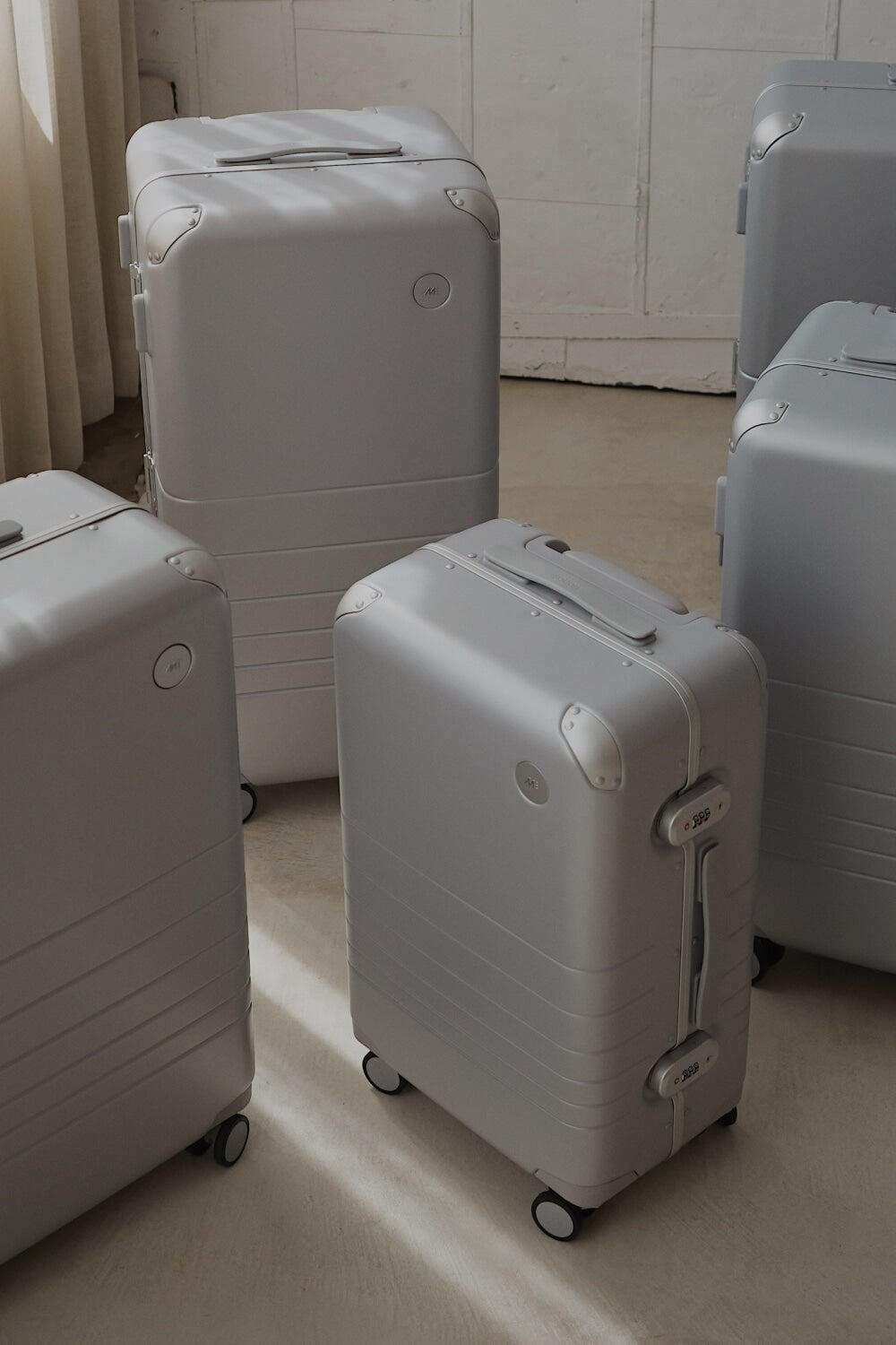 A close-up view of the  Hybrid collection in Silver, softly lit in a minimalist setting.