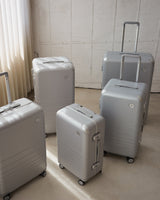The Hybrid collection in silver on a light-colored floor with a neutral background.