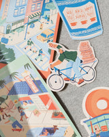 A playful mix of Destination Stickers featuring city streets, palm-lined motels, a cyclist balancing pizza boxes, and a classic coffee cup design.