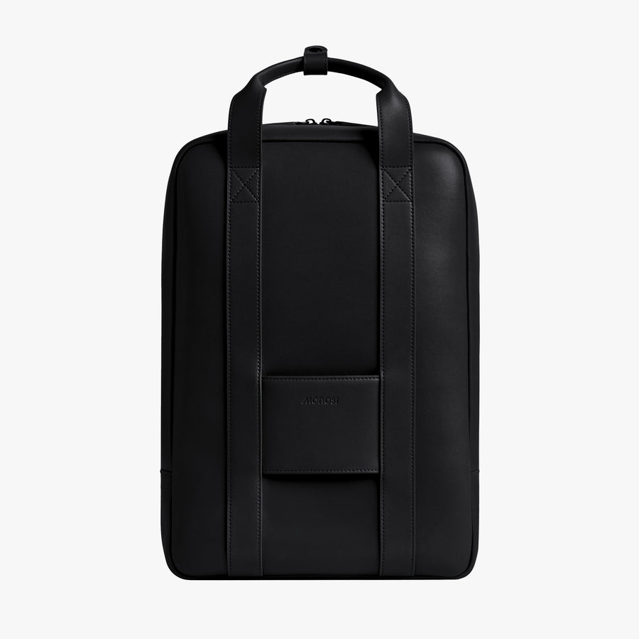 Carbon Black (Vegan Leather) | Back view of Metro Backpack Carbon Black