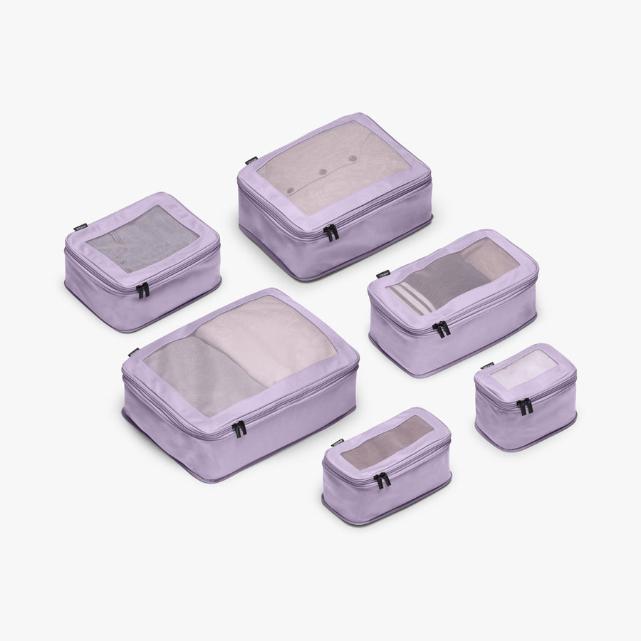 Set of Six / Purple Icing | This is a photo of a set of six compressible packing cubes in Purple Icing