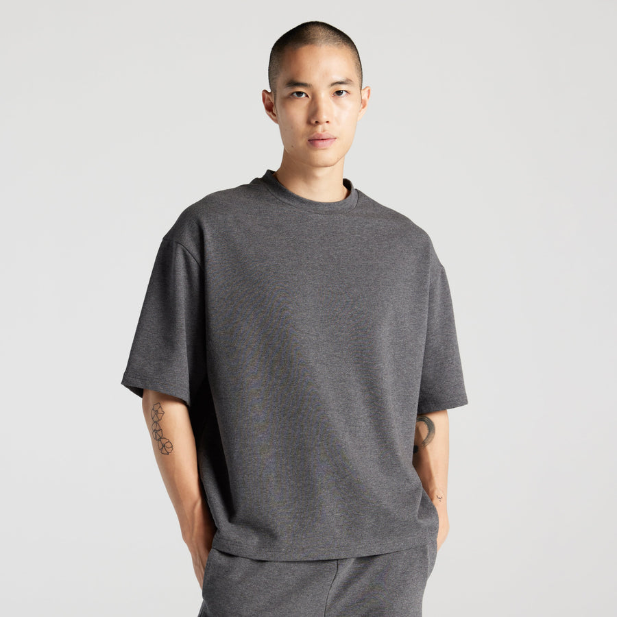 Heather Charcoal Cart | Front view of man in Kyoto Short Sleeve in Heather Charcoal