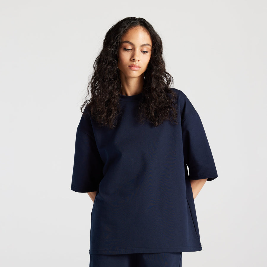 Navy Cart | Front view of woman in Kyoto Short Sleeve in Navy