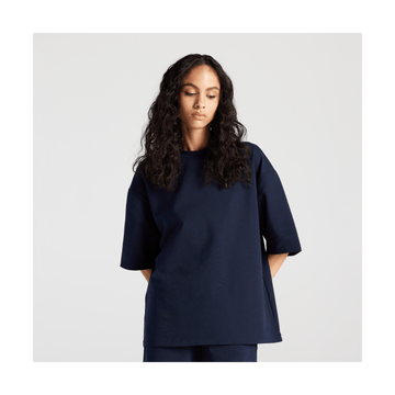 Front view of woman in Kyoto Short Sleeve in Navy