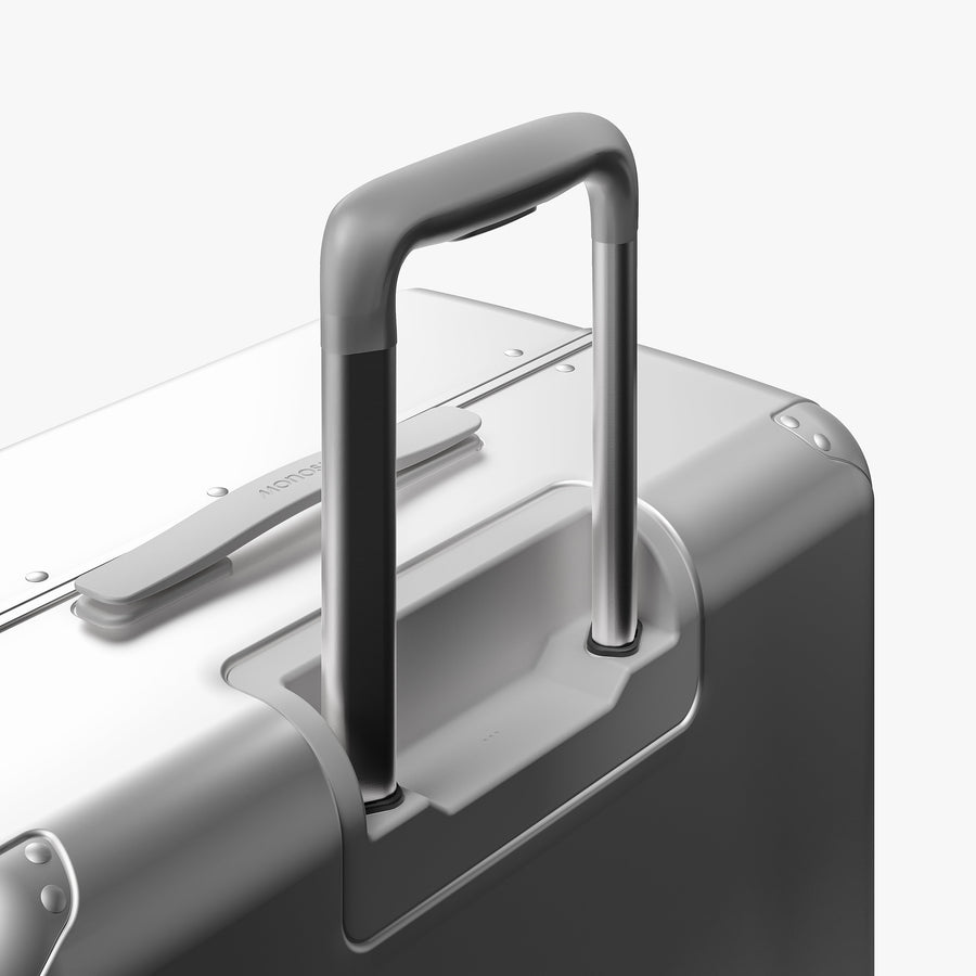 Silver | Extended luggage handle view of Hybrid Check-In Large in Silver