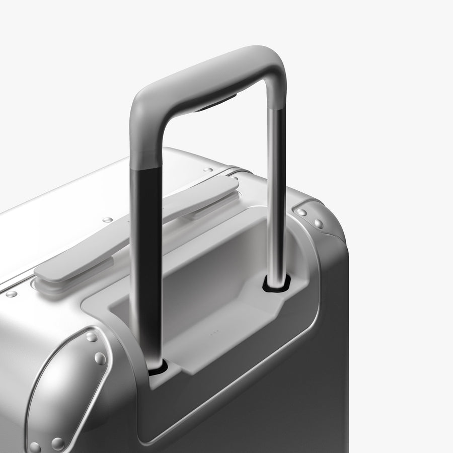 Silver | Extended luggage handle view of Hybrid Carry-On in Silver