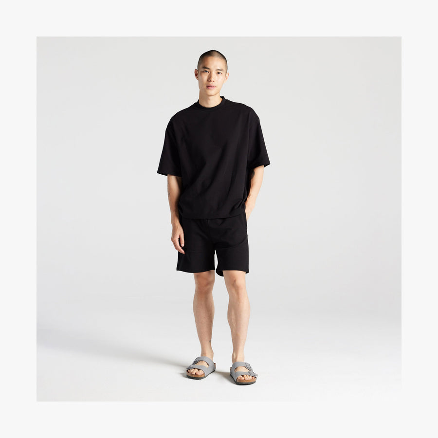 Black | Full body front view of man in Kyoto Short Sleeve in Black