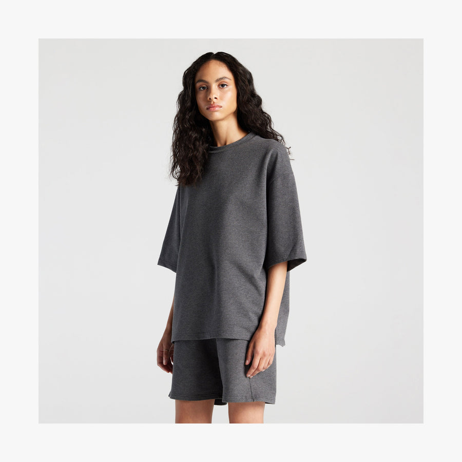 Heather Charcoal | Front view of woman in Kyoto Short Sleeve in Heather Charcoal