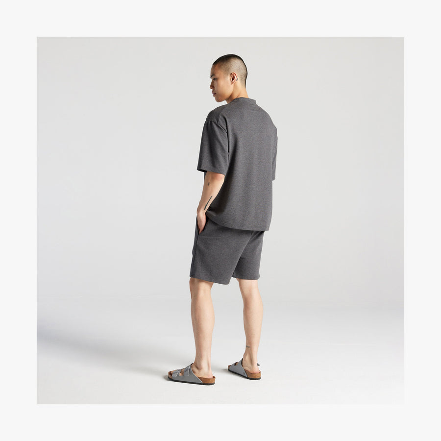 Heather Charcoal | Full body back view of man in Kyoto Short Sleeve in Heather Charcoal