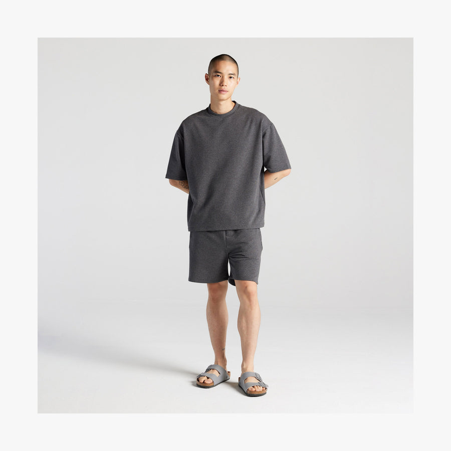 Heather Charcoal | Full body front view of man in Kyoto Short Sleeve in Heather Charcoal