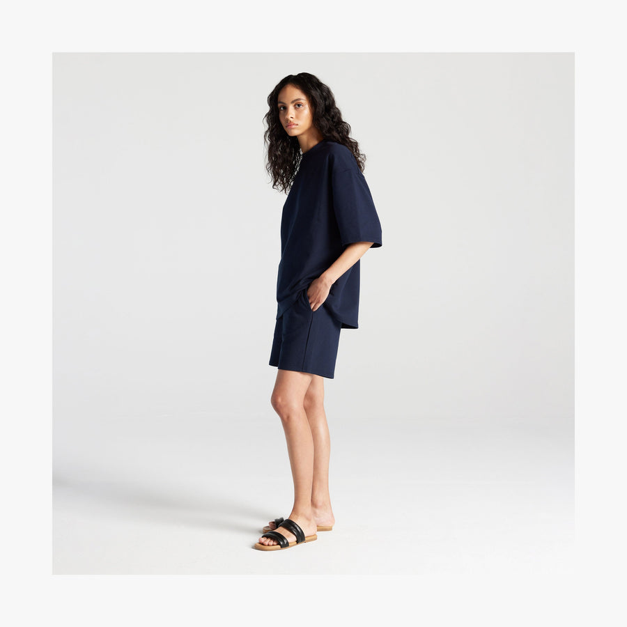 Navy | Full body side view of woman in Kyoto Short Sleeve in Navy