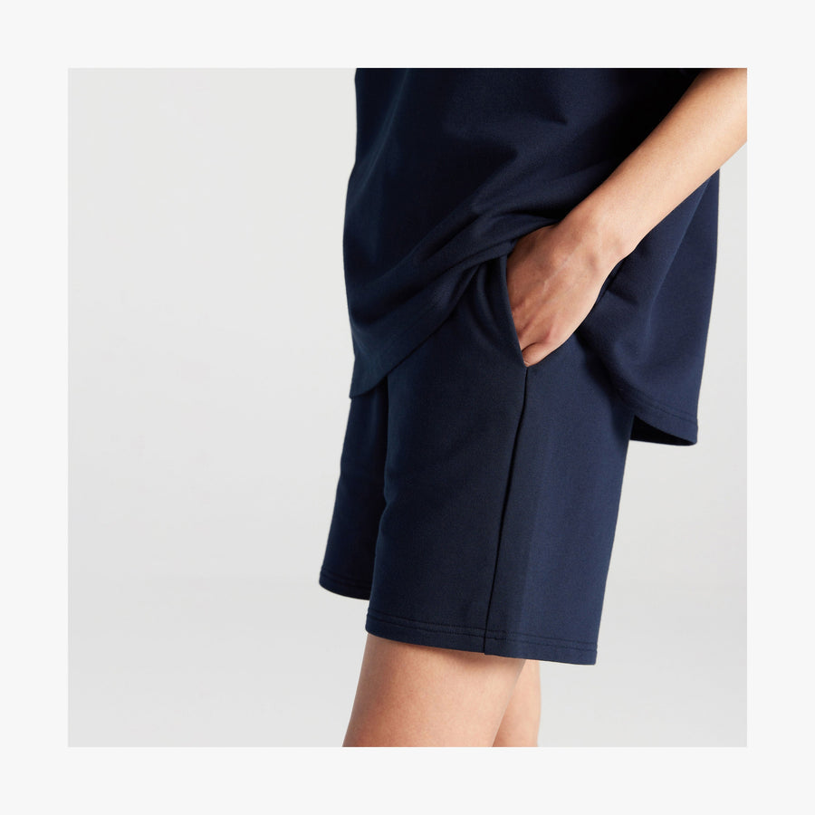 Navy | Side pocket view of woman in Kyoto Shorts in Navy