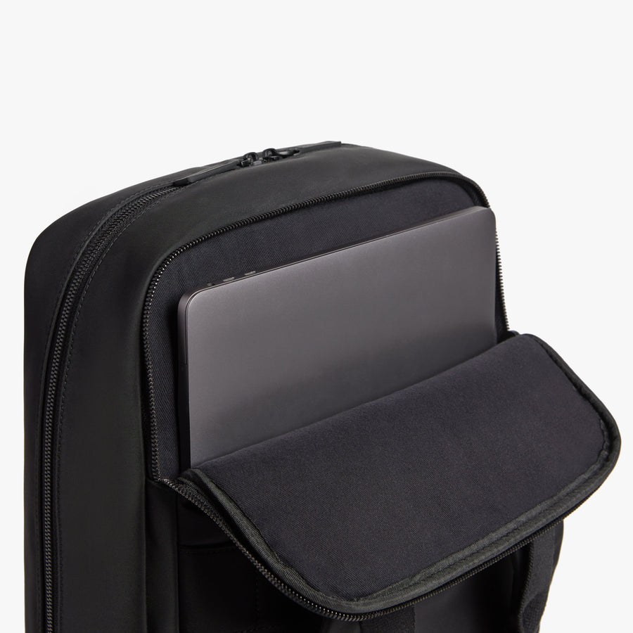 black vegan leather multi-compartment backpack Monos Best Travel Backpack - Black - Vegan Leather - 18L