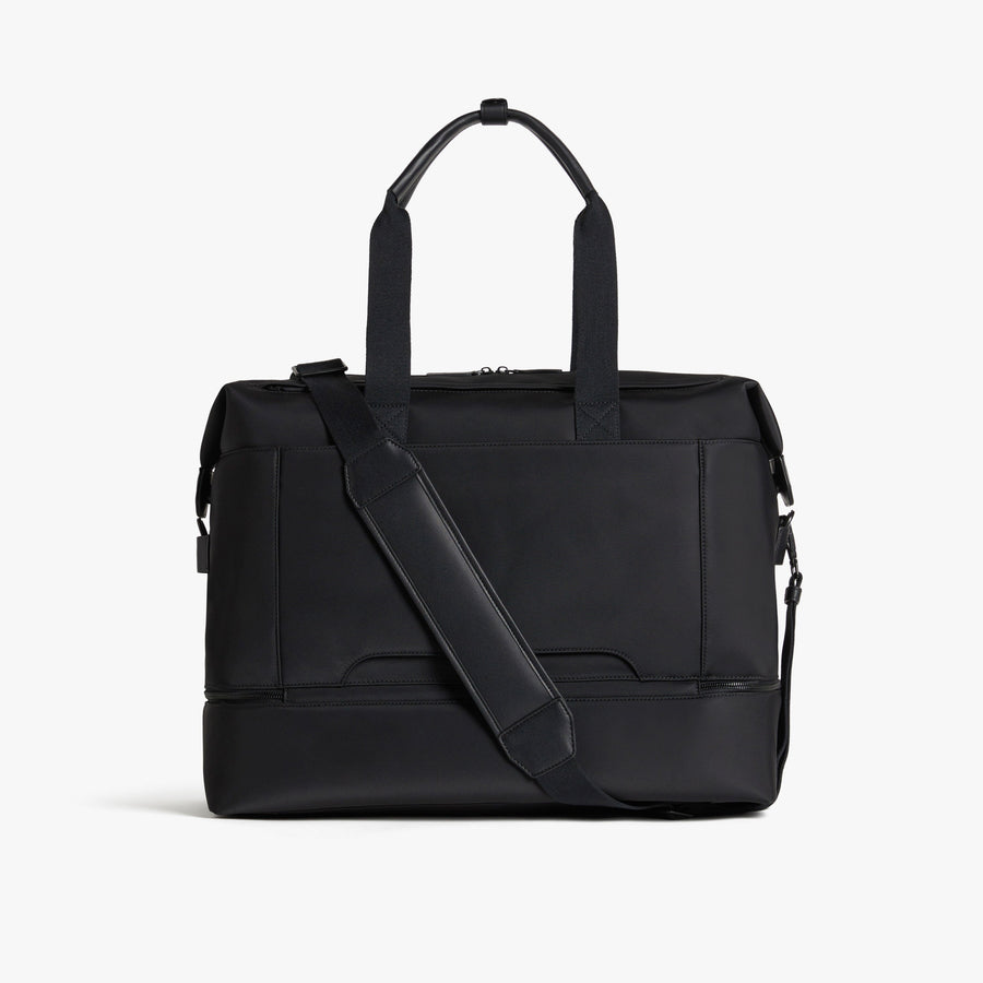 Carbon Black | Back view with strap of Metro Weekender in Carbon Black