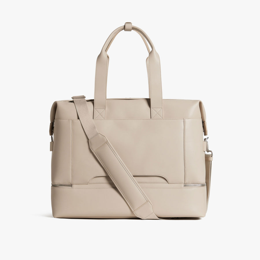 Ivory (Vegan Leather) | Back view with strap of Metro Weekender in Ivory