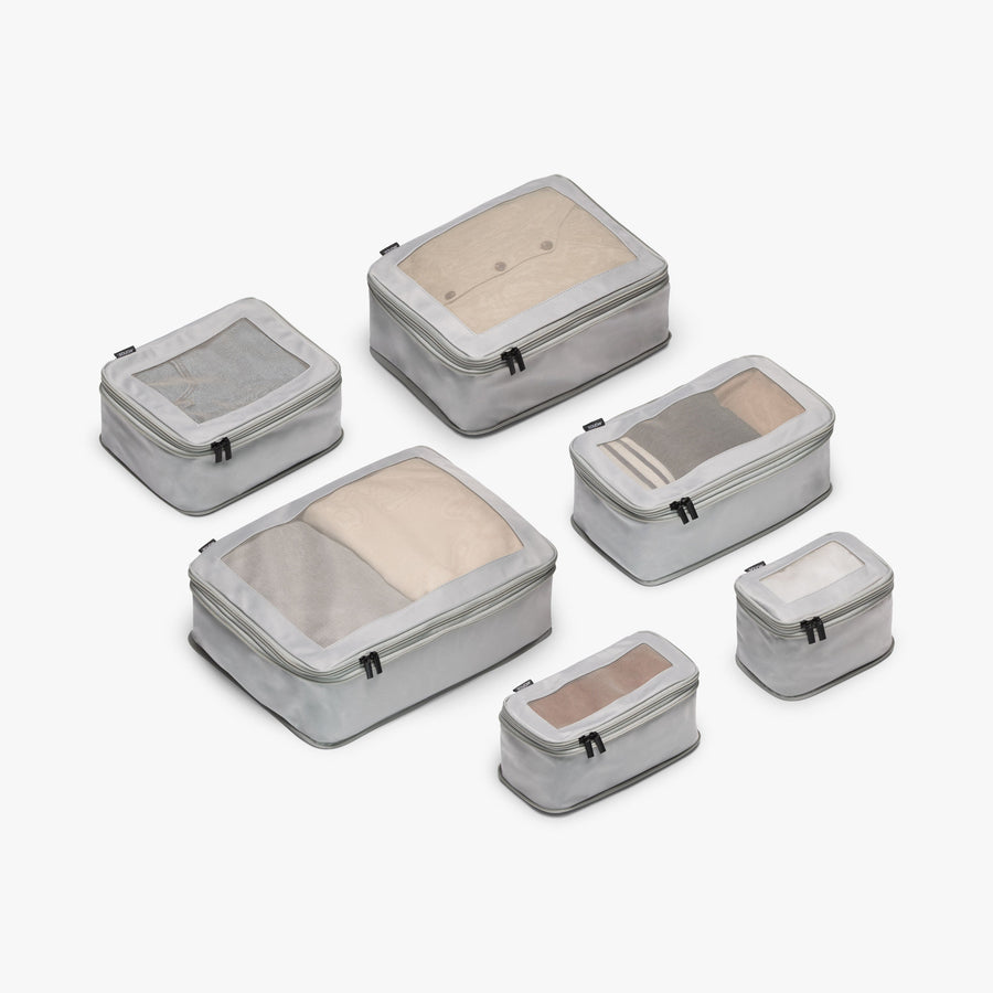 Set of Six / Grey | This is a photo of a set of six compressible packing cubes in grey