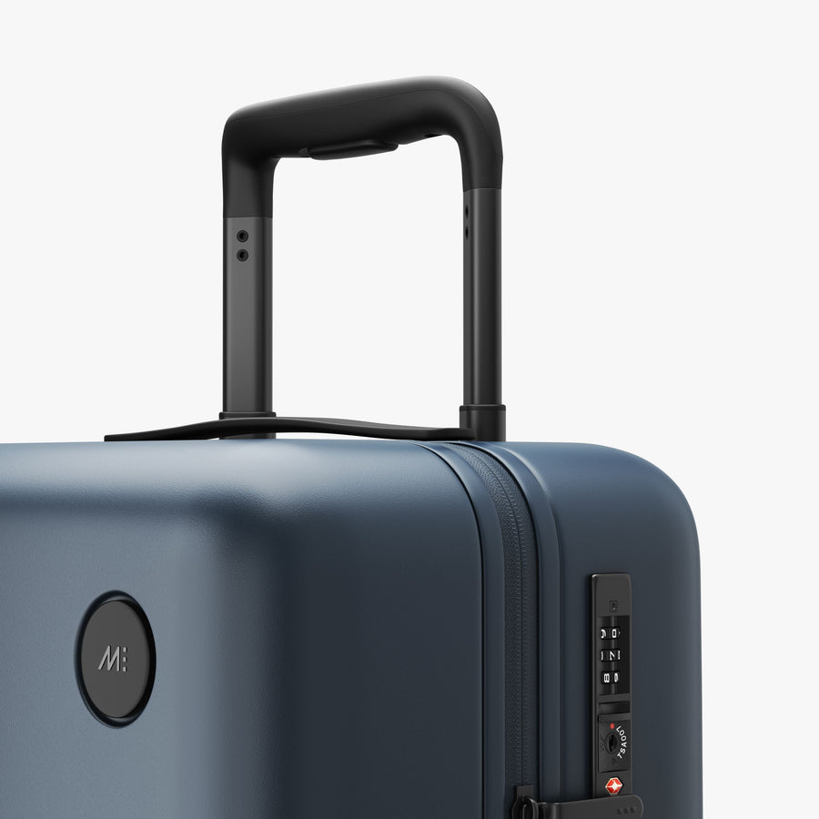 Ocean Blue | Luggage handle view of Carry-On Plus in Ocean Blue
