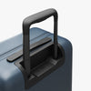 Extended luggage handle view of Carry-On Plus in Ocean Blue (thumbnail)