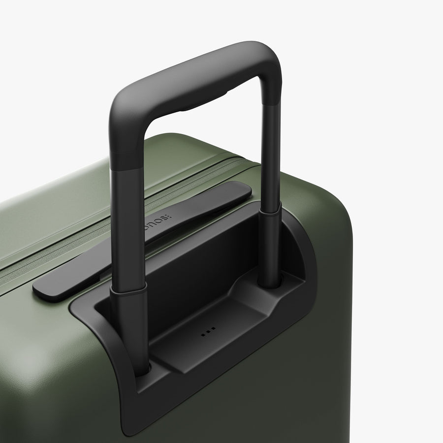 Olive Green | Extended luggage handle view of Carry-On Plus in Olive Green