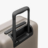 Extended luggage handle view of Carry-On Pro in Desert Taupe (thumbnail)