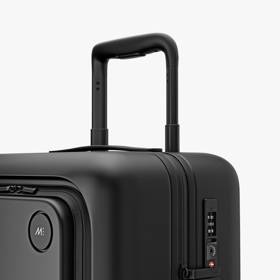 Midnight Black | Luggage handle view of Carry-On Pro in Midnight Black